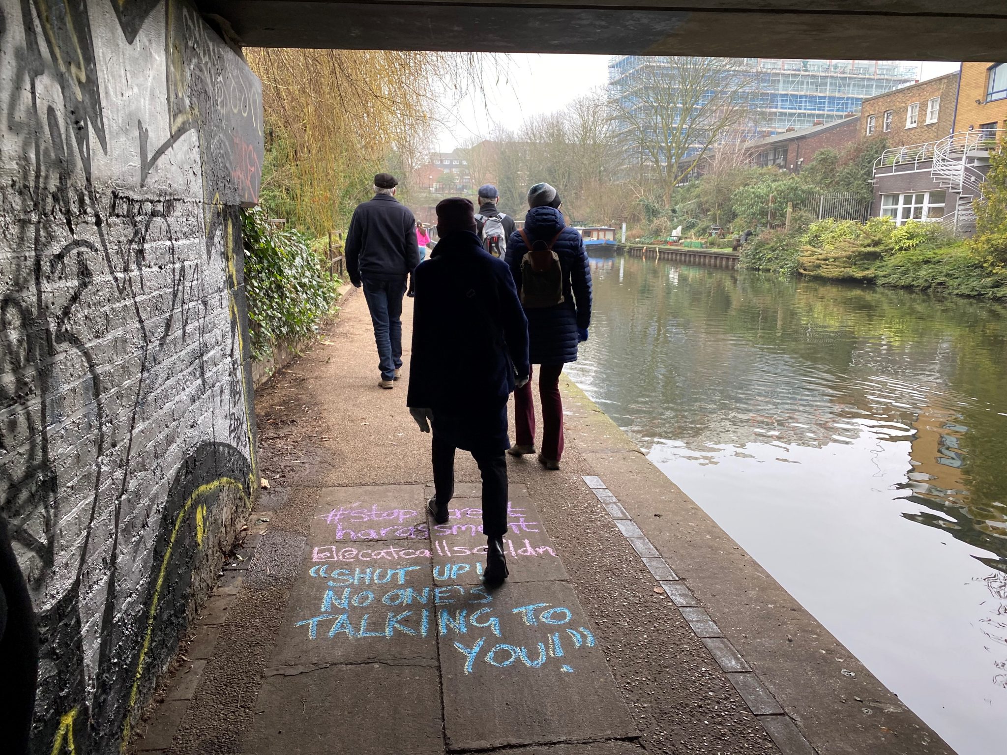 Catcalling chalk art on the pavement