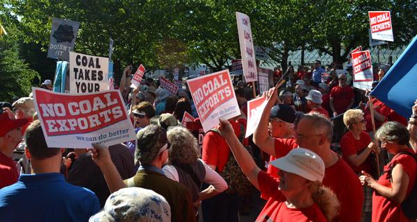 Environment and conservation activists protest proposed coal export terminals in Portland, Oregon.