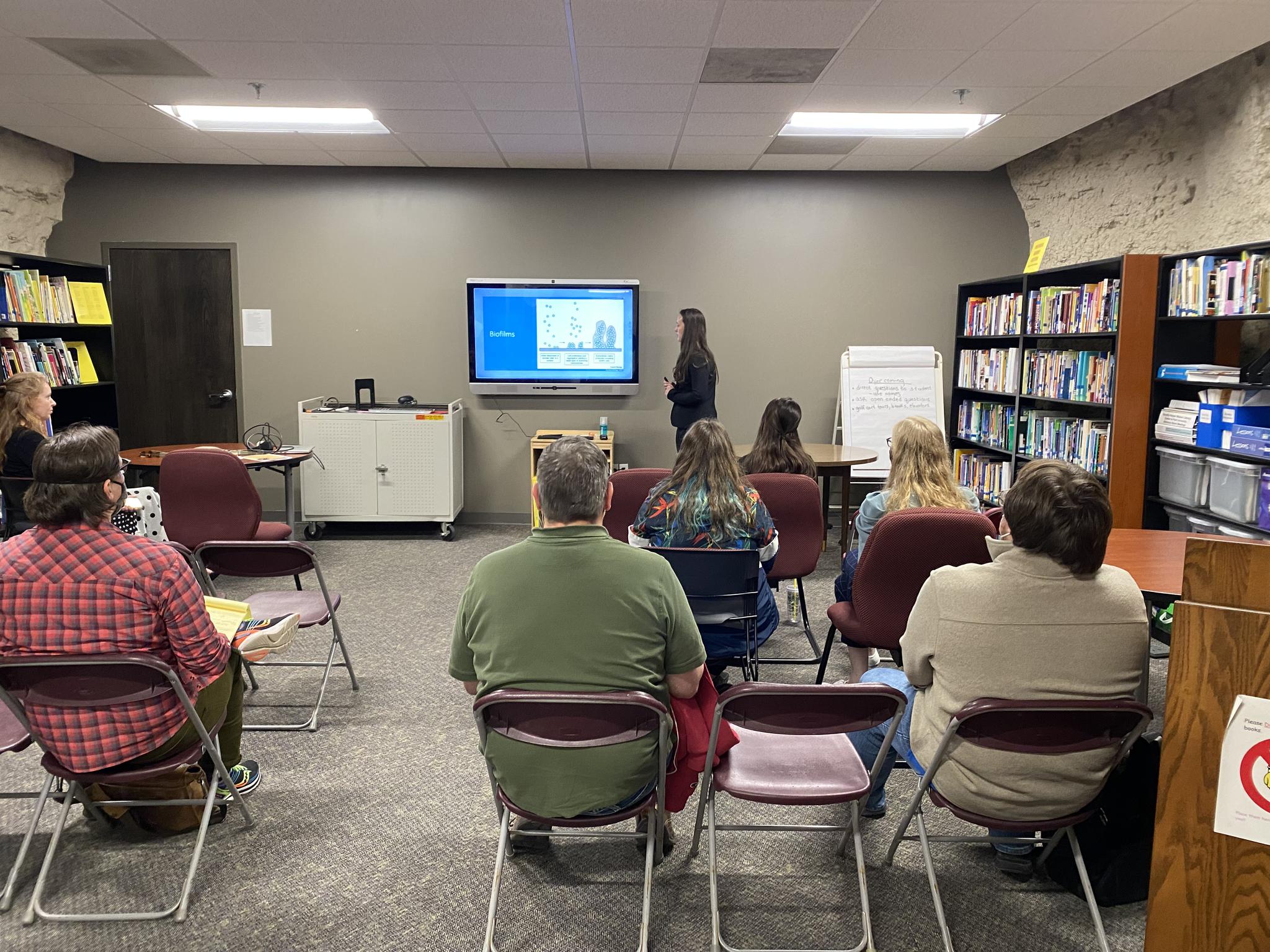 Senior biology major Lucy Fine presents her Honors Academy presentation in front of peers and faculty.