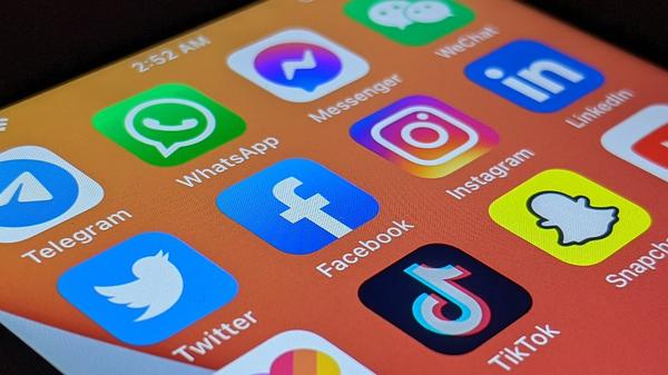 Close up of social media apps on a smart phone screen Close up of social media apps on a smart phone screen