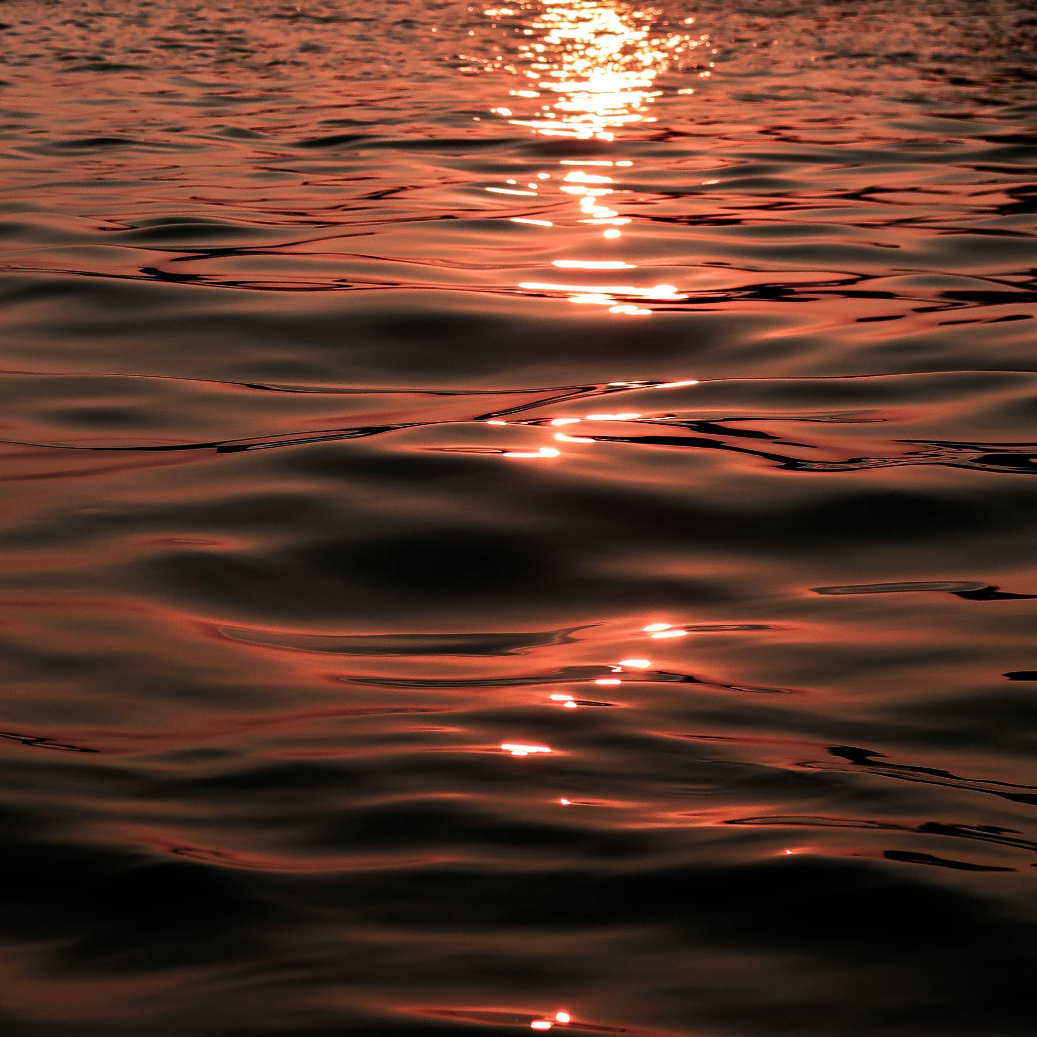 Link to About Me page represented by water surface image.