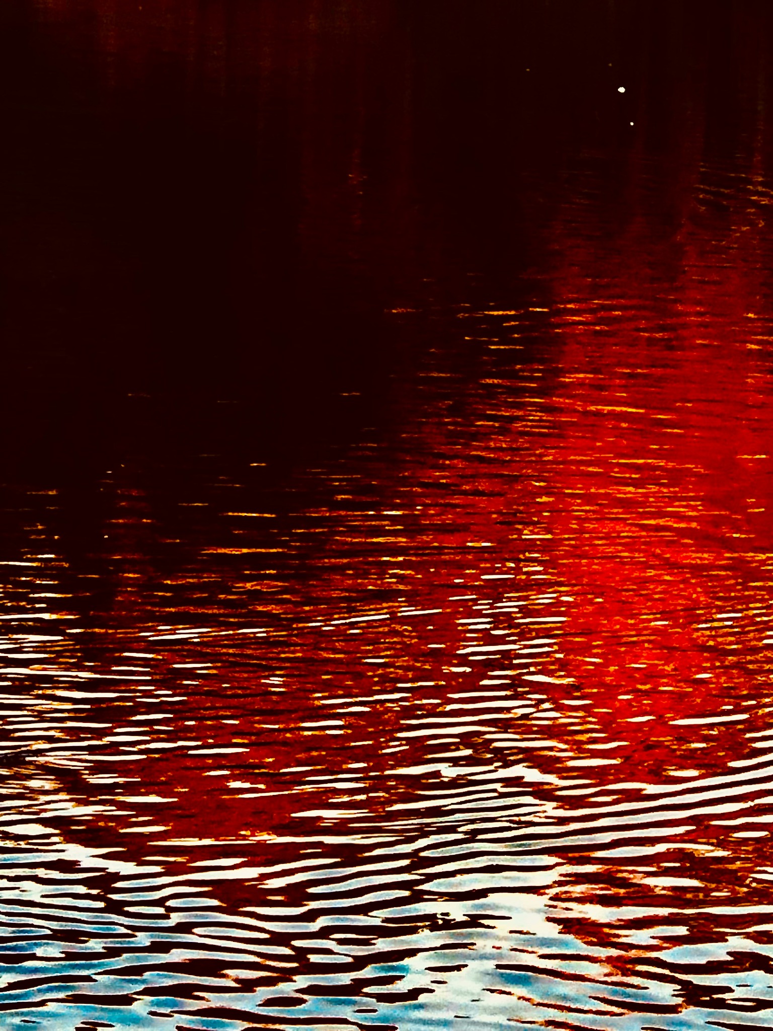 Link to creative work page represented by water surface image.