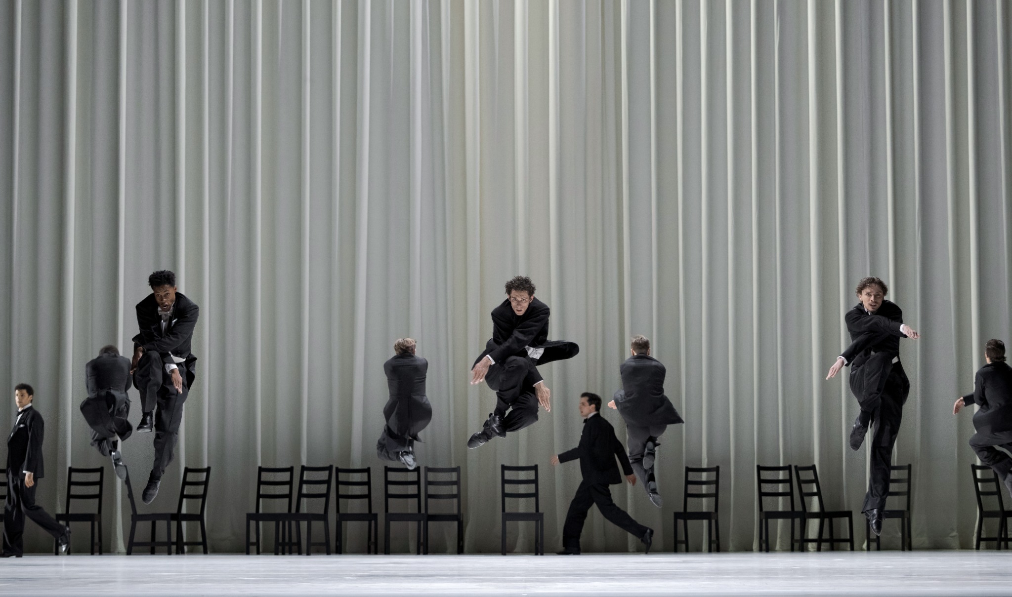 Shaakir Muhammad, Christopher Gerty and Matthieu Pagès with Artists of the Ballet in Procession. Photo by Karolina Kuras. Courtesy of The National Ballet of Canada.