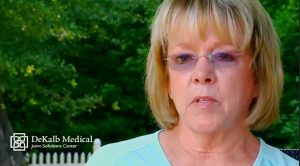 woman speaking on camera