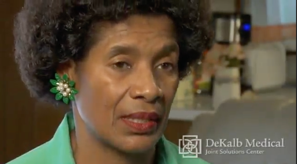 woman speaking on camera