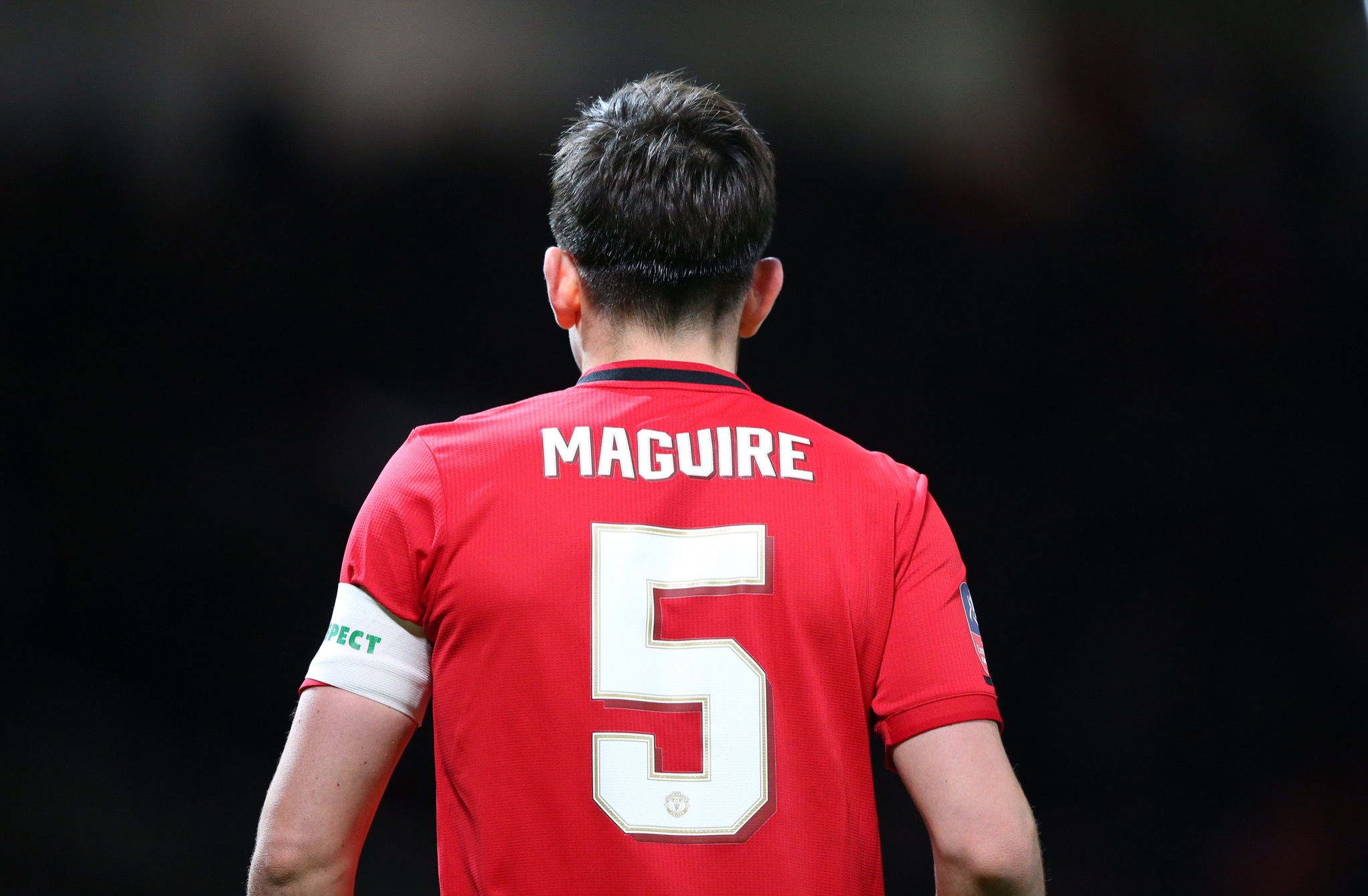 Maguire with captain armband