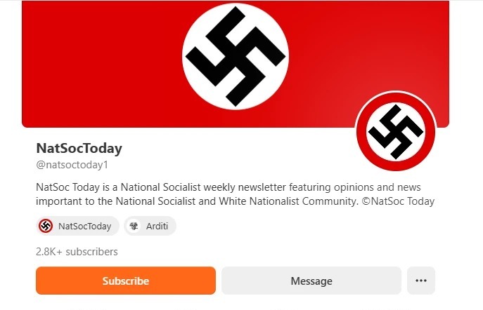A Substack screenshot is seen. Against a cream background, a black swastika is seen in a white circle against a red background. Underneath, text states: NatSocToday @natsoctoday1NatSoc Today is a National Socialist weekly newsletter featuring opinions and news important to the National Socialist and White Nationalist Community. ©️NatSoc Today NatSocToday Arditi 2.8K+ subscribers Subscribe Message ...