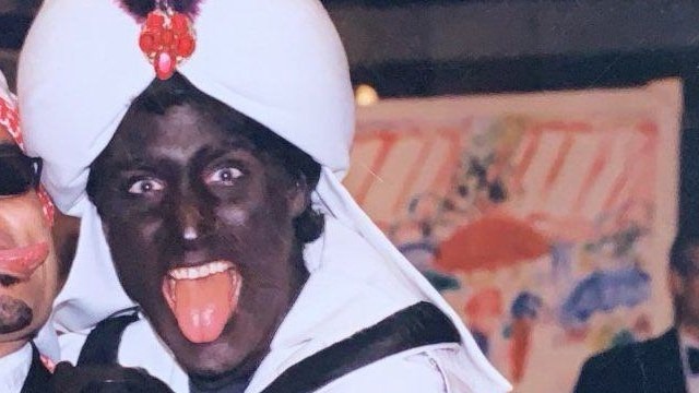 Justin Trudeau, a white man, is seen in Blackface, which he admits was not a single isolated incident, as he cannot confirm how many times he did this.