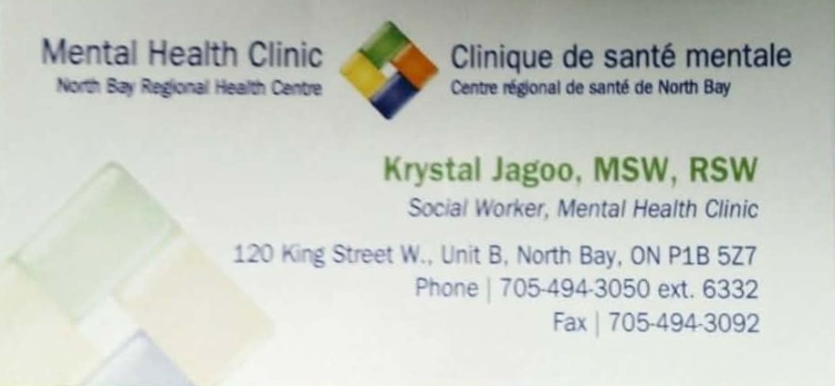 A past business card from the author's permanent full-time unionized therapist job is seen. It states: Mental Health Clinic North Bay Regional Health Centre Clinique de santé mentale Centre régional de santé de North Bay Krystal Kavita Jagoo, MSW, RSW Social Worker, Mental Health Clinic 120 King Street W., Unit B, North Bay, ON P1B 5Z7 Phone 705-494-3050 ext. 6332 Fax 705-494-3092