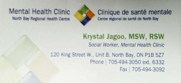 A past business card from the author's permanent full-time unionized therapist job is seen. It states: Mental Health Clinic North Bay Regional Health Centre Clinique de santé mentale Centre régional de santé de North Bay Krystal Kavita Jagoo, MSW, RSW Social Worker, Mental Health Clinic 120 King Street W., Unit B, North Bay, ON P1B 5Z7 Phone 705-494-3050 ext. 6332 Fax 705-494-3092