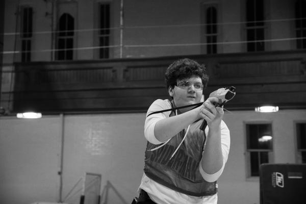 Player holding Nerf Blaster in Black and White