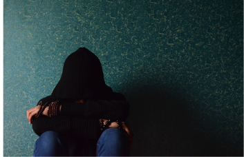 girl sitting depressed