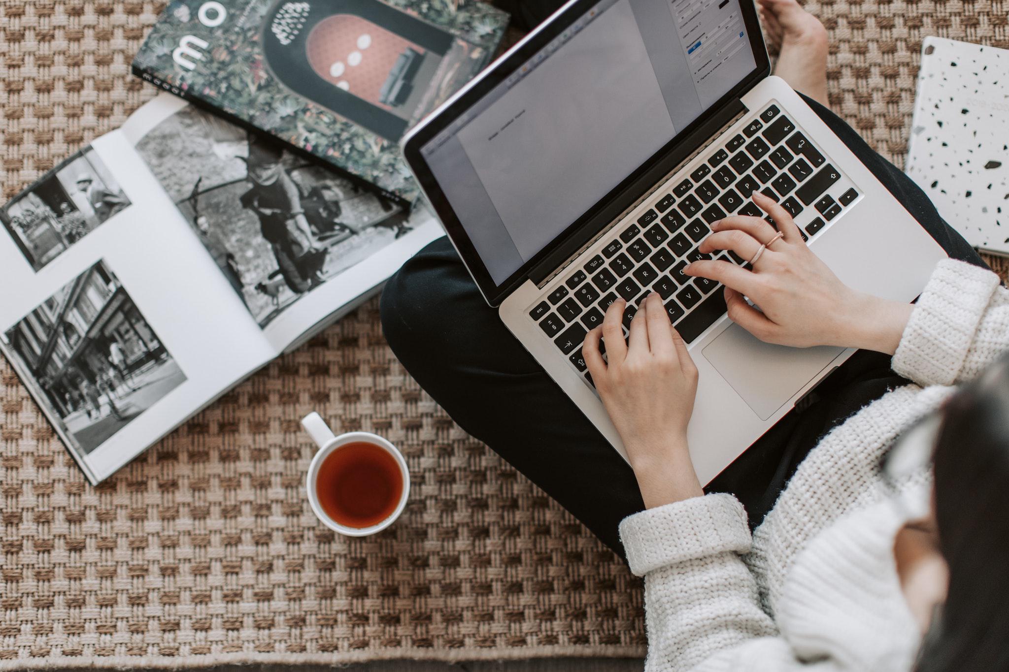 A woman creating an interactive whitepaper for a client A woman creating an interactive whitepaper for a client