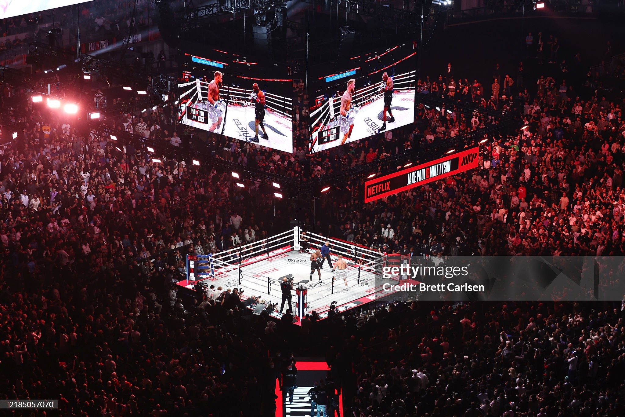 ARLINGTON, TEXAS - NOVEMBER 15: (L-R) Jake Paul and Mike Tyson fight during LIVE On Netflix: Jake Paul vs. Mike Tyson at AT&T Stadium on November 15, 2024 in Arlington, Texas. (Photo by Brett Carlsen/Getty Images for Netflix © 2024)