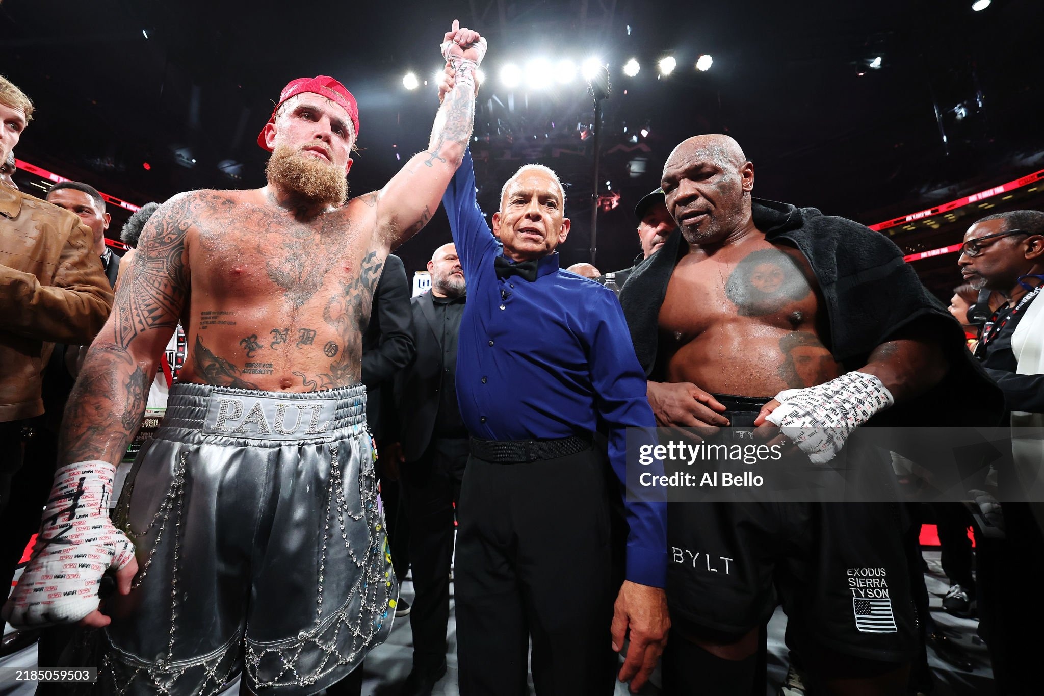 ARLINGTON, TEXAS - NOVEMBER 15: (L-R) Jake Paul announced as winner against Mike Tyson during LIVE On Netflix: Jake Paul vs. Mike Tyson at AT&T Stadium on November 15, 2024 in Arlington, Texas. (Photo by Al Bello/Getty Images for Netflix © 2024)