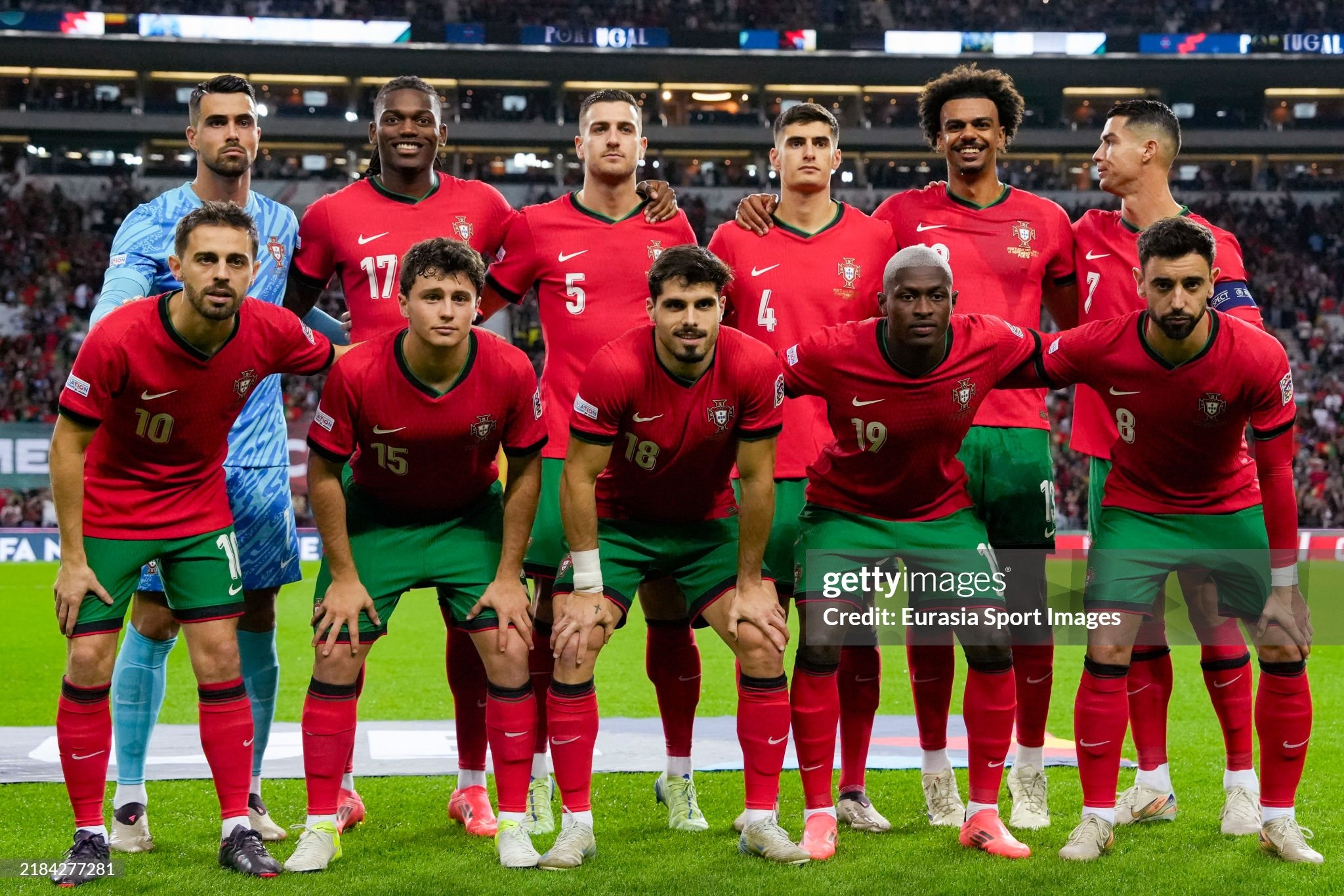 PORTO, PORTUGAL - NOVEMBER 15: Diogo Costa, Rafael Leão, Diogo Dalot, António Silva, Renato Veiga, Cristiano Ronaldo, Bernardo Silva, João Neves, Pedro Neto, Nuno Mendes and Bruno Fernandes of Portugal pose for a team photo prior to the UEFA Nations League 2024/25 League A Group A1 match between Portugal and Poland at Estadio do Dragao on November 15, 2024 in Porto, Portugal. (Photo by Pedro Loureiro/Eurasia Sport Images/Getty Images)