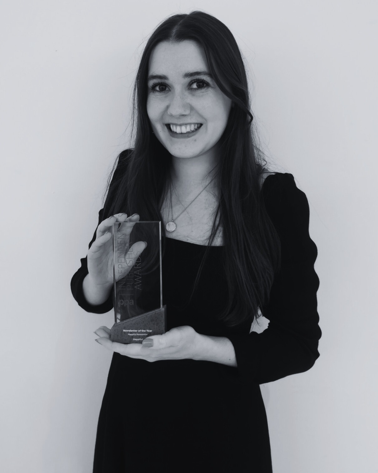 Kathryn Wheeler holding a trophy at the IPPA awards Kathryn Wheeler holding a trophy at the IPPA awards