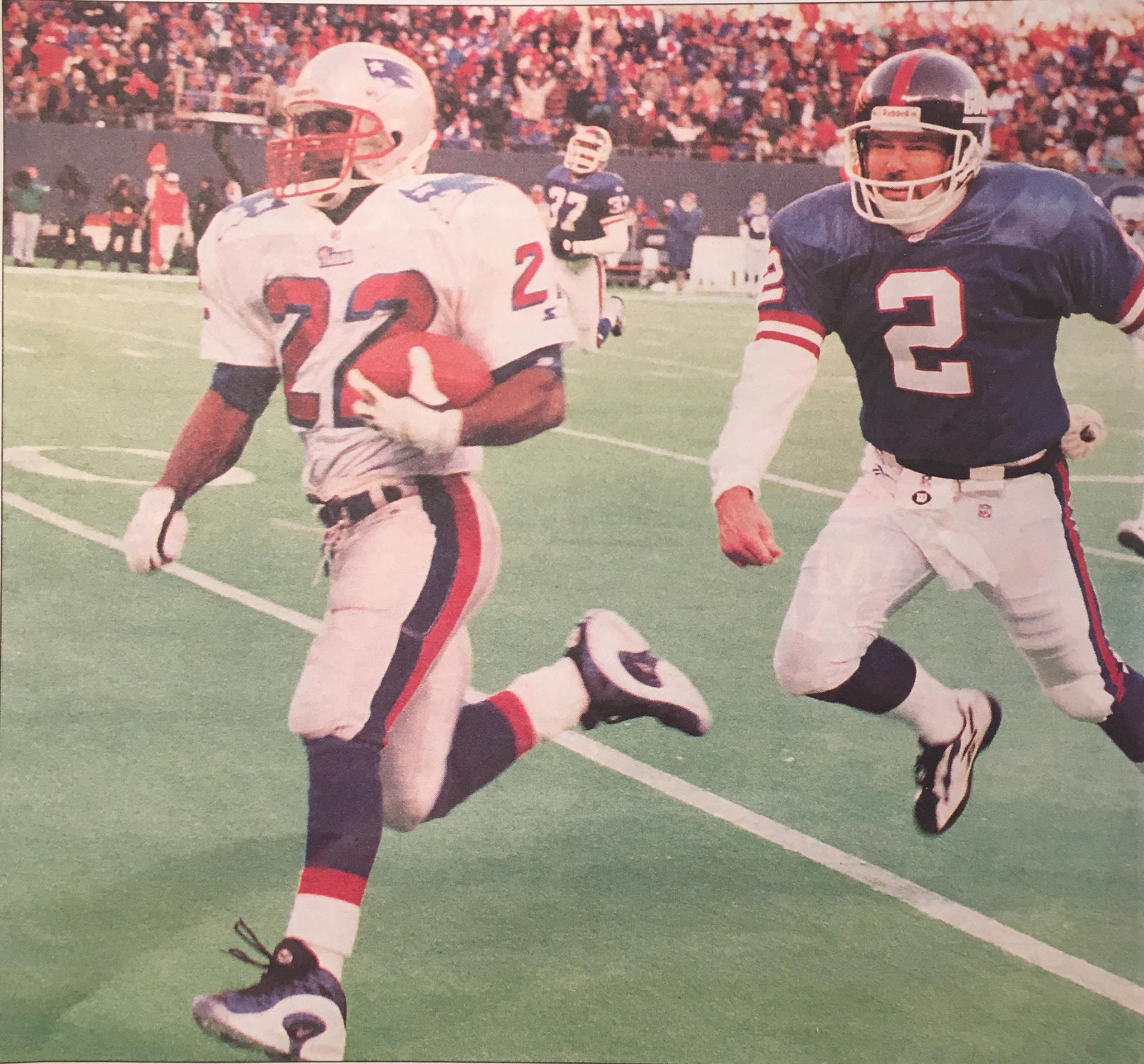 Dave Meggett outruns punter Mike Horan for a punt return for a touchdown.