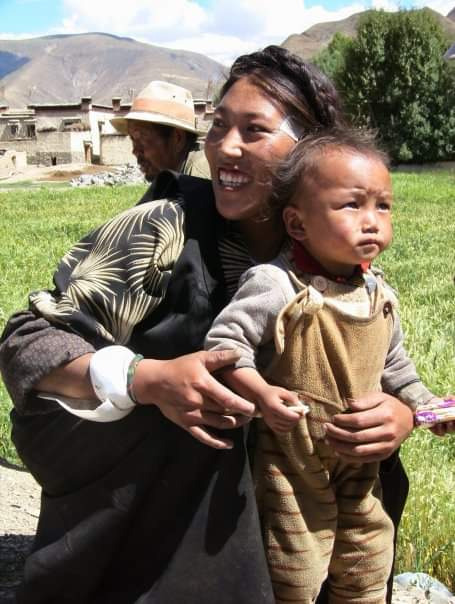 Tibet - Woman and child