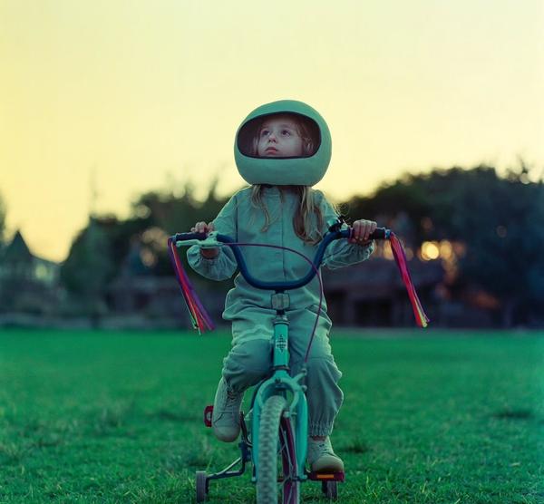 Lonely rocketgirl on a bicycle
