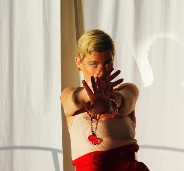 Sara Høyrup with her hands up in front