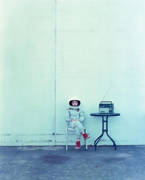 Lonely rocketgirl with a transistor radio