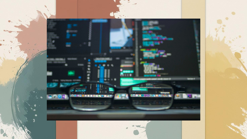 Closeup of eyeglasses in front of a computer screen with blurred code, symbolizing how schema markup makes blog content clear and visible in search results. Closeup of eyeglasses in front of a computer screen with blurred code, symbolizing how schema markup makes blog content clear and visible in search results.