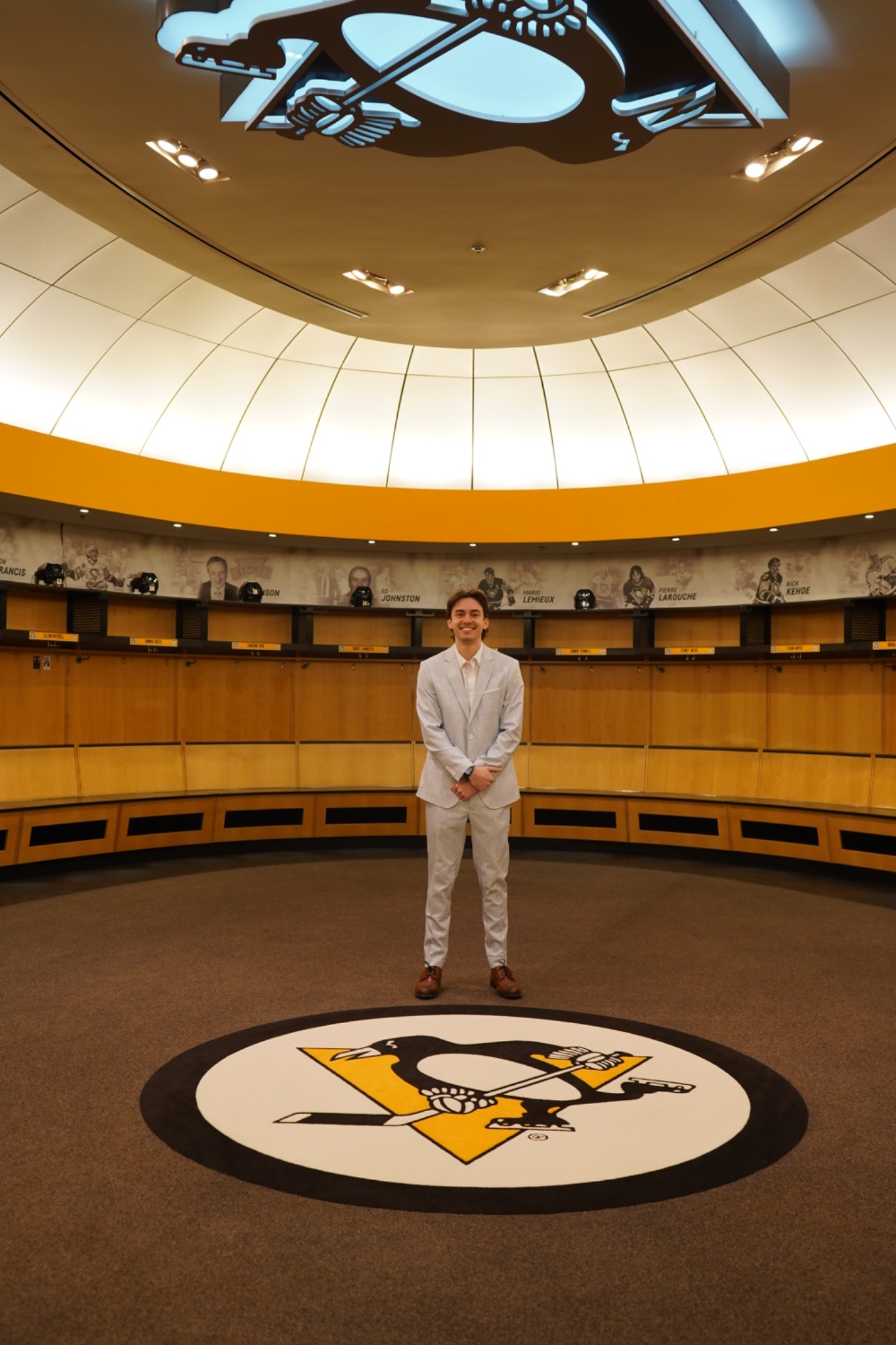 Nick Licata standing in Penguins locker room