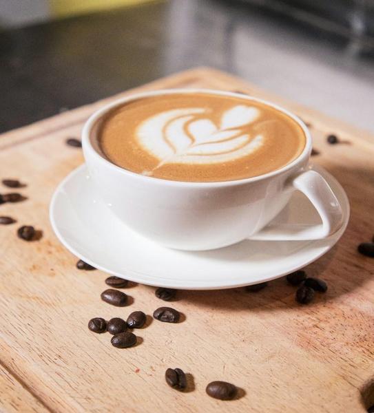 a-cup-of-coffee-with-coffee-beans-4whF-4x-e4w a-cup-of-coffee-with-coffee-beans-4whF-4x-e4w