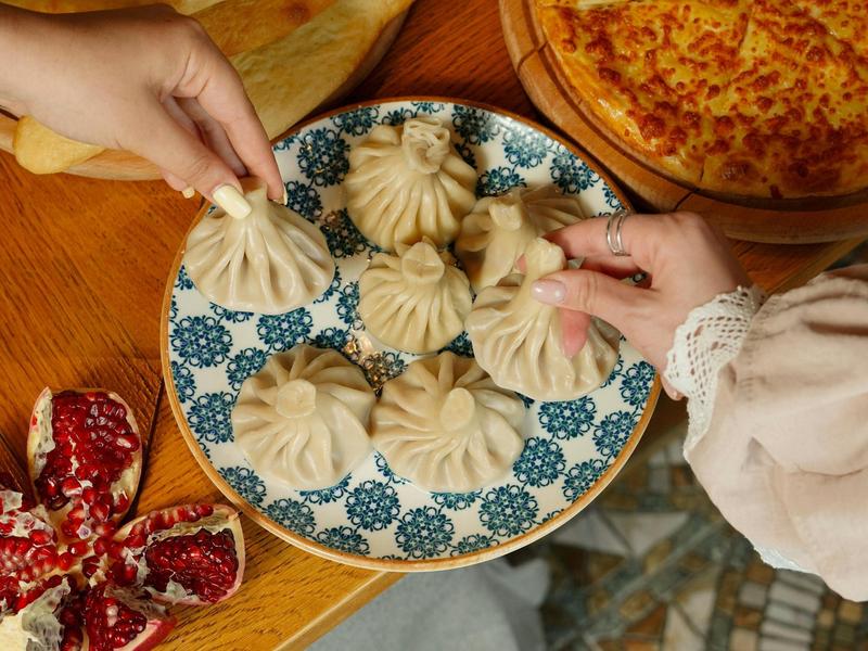 hand-holding-dumplings-17543159/ hand-holding-dumplings-17543159/