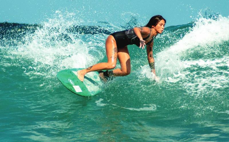 Filipina woman surfing Filipina woman surfing