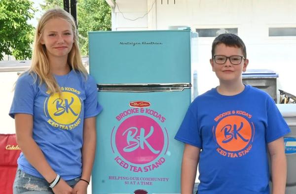 Brooke and Koda Iced Tea Stand