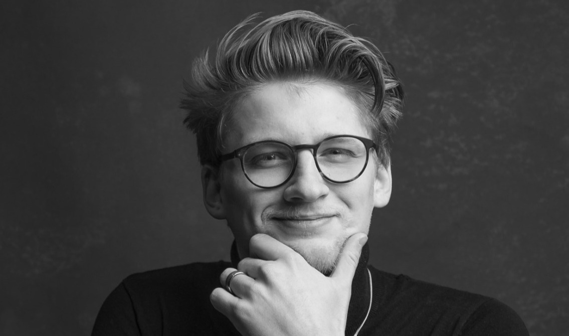 A headshot of freelance journalist and visual storyteller Ben Little.