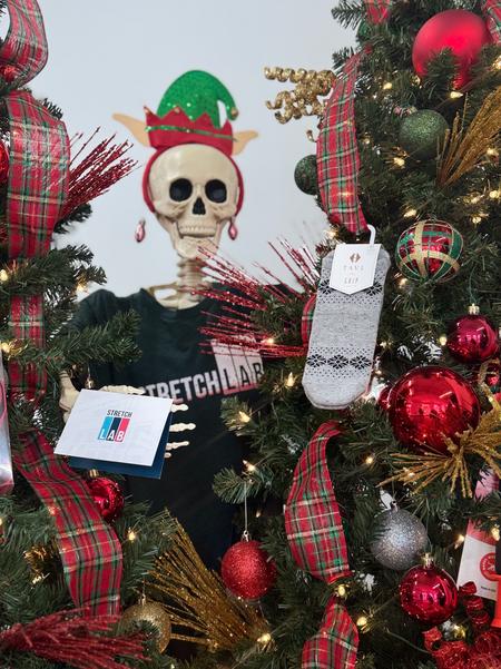 Skully Celebrates Christmas with StretchLab