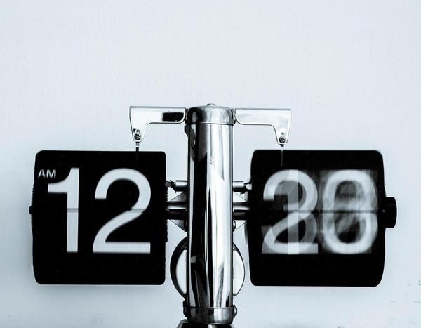 Digital clock who's minutes are going by so fast that they blur together, on a white background - Neurospicy Hustler's Digital clock who's minutes are going by so fast that they blur together, on a white background - Neurospicy Hustler's
