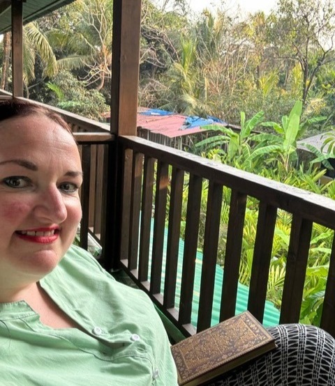 Sitting on my balcony, writing my diary in Goa