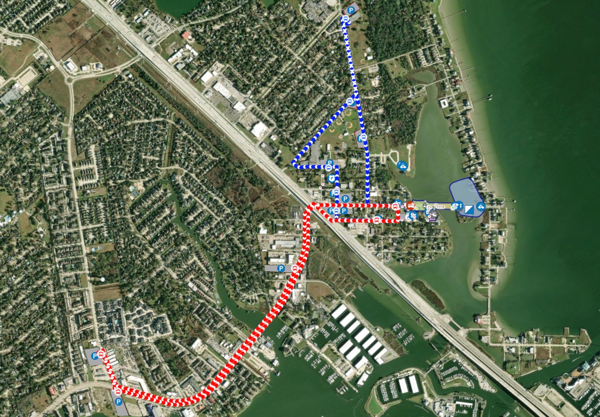 GIS spatial logistics map for Fleet Week Houston engineered in Esri ArcMap. The visualization displays a detailed urban infrastructure schema featuring dual-route shuttle paths (blue and red vector lines), parking asset markers (P-markers), and multi-agency facility plotting for high-traffic municipal event management.