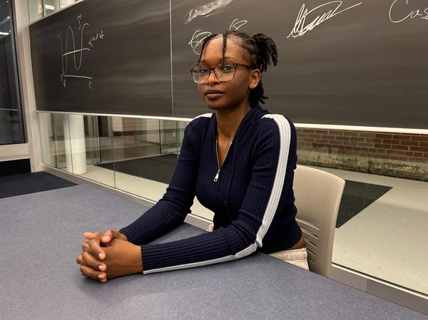 Kamilah Boswell sitting at a desk Kamilah Boswell sitting at a desk