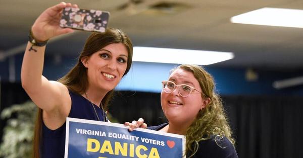 Virginia Delegate Danica Roem, left, takes a selfie with Natalie Landin, of Charlottesville, Va., after a news conference to announce the Human Rights Campaign's historic endorsement of 27 pro-equality candidates across Virginia on Thursday, Aug. 15, 2019 in Richmond, Va.