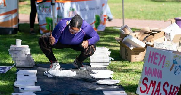 Weight scale smashing booth at the Body Love Fair hosted by the Student Assembly for Gender Empowerment.