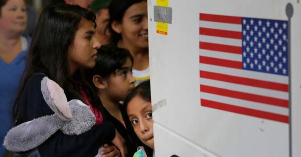 FILE - In this July 7, 2015 file photo, immigrants from El Salvador and Guatemala who entered the country illegally board a bus after they were released from a family detention center in San Antonio. Attorneys on Friday, Aug. 30, 2019, asked a judge to reject Trump administration plans to detain migrant families longer than they're allowed now and to remove court oversight of how children are treated in government custody.