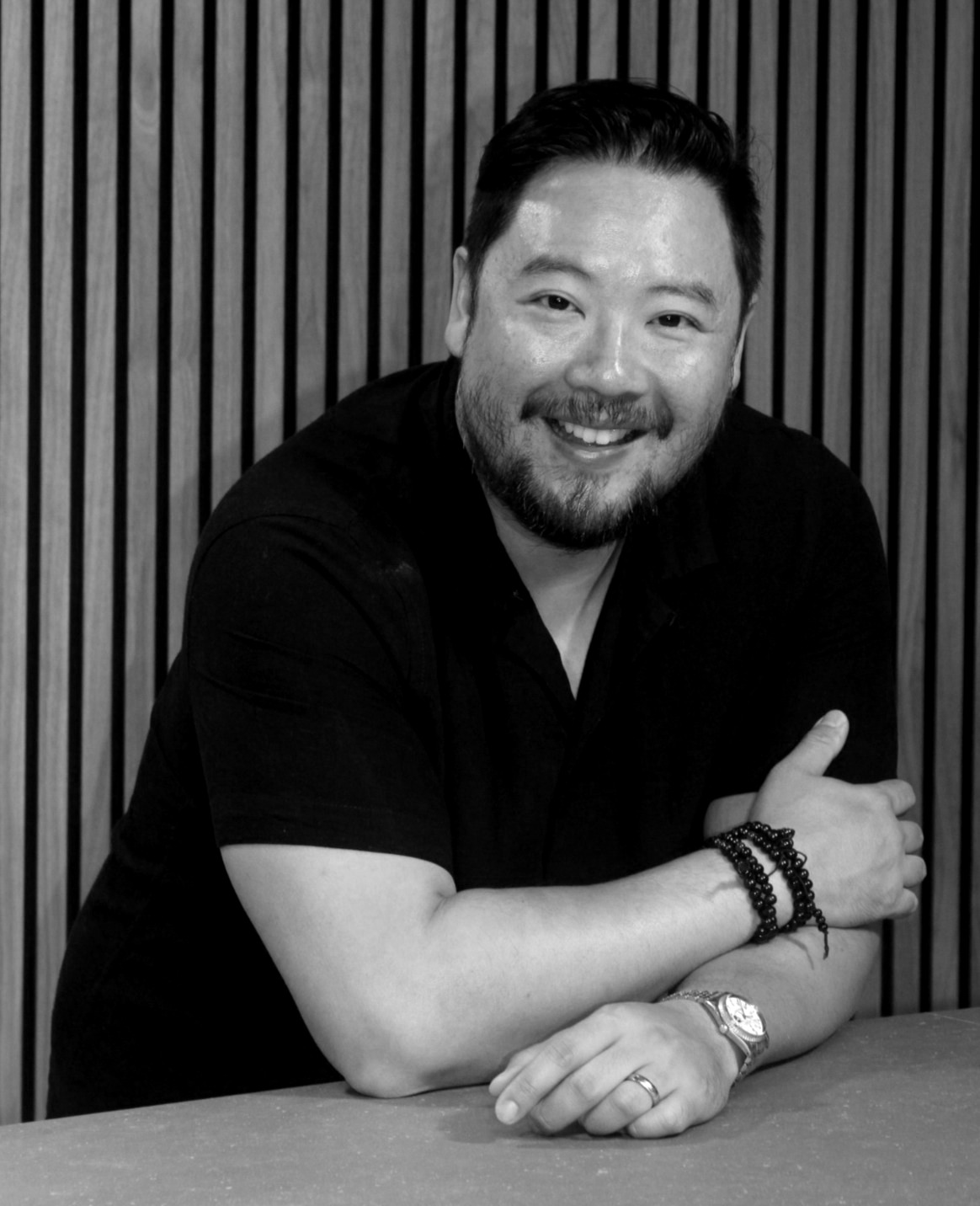 Adrian Ma standing in studio