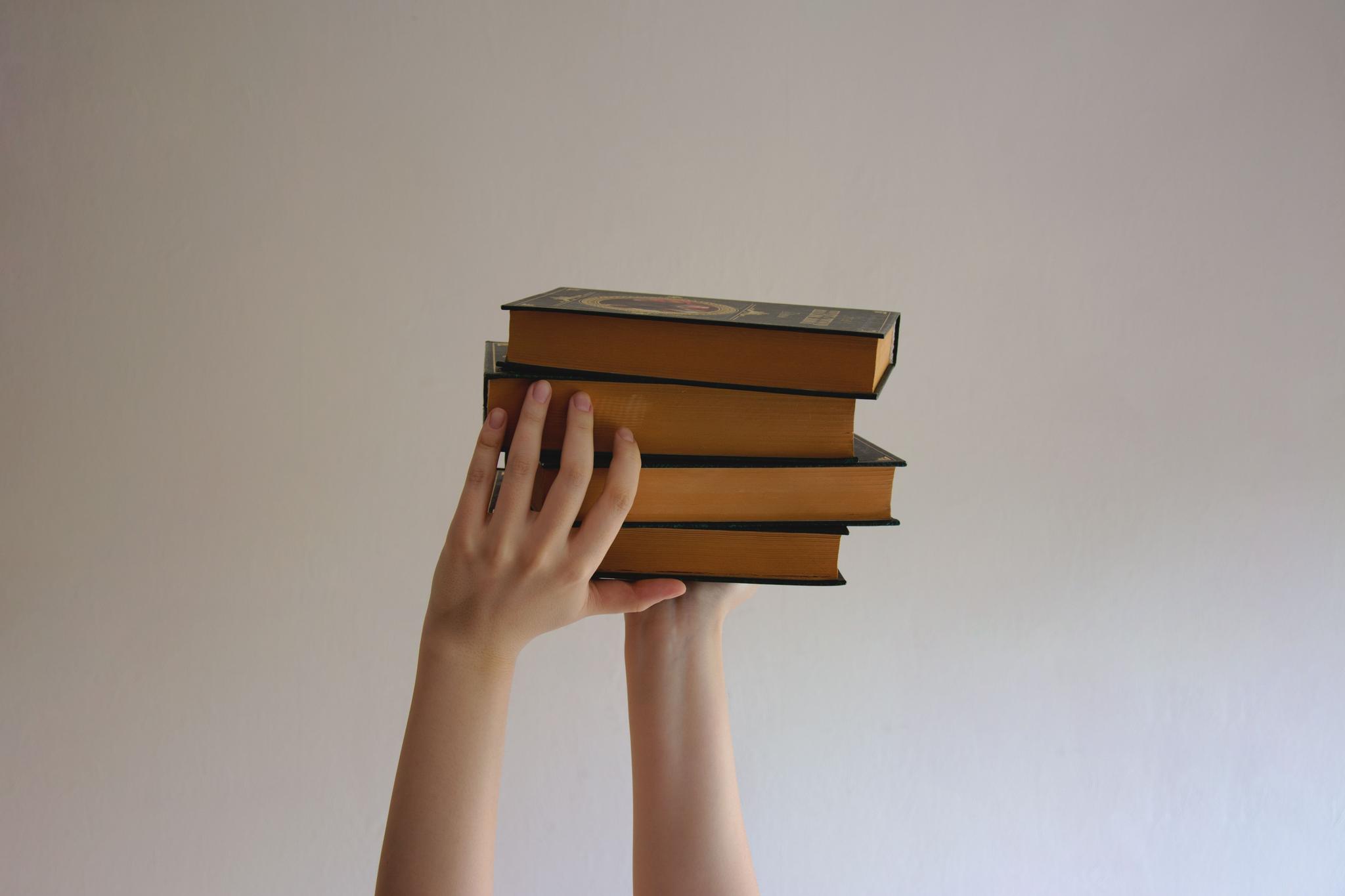 woman holding books