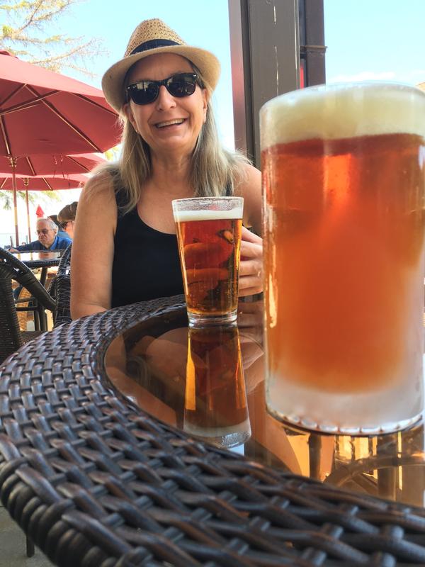 wife enjoying beer at restaurant
