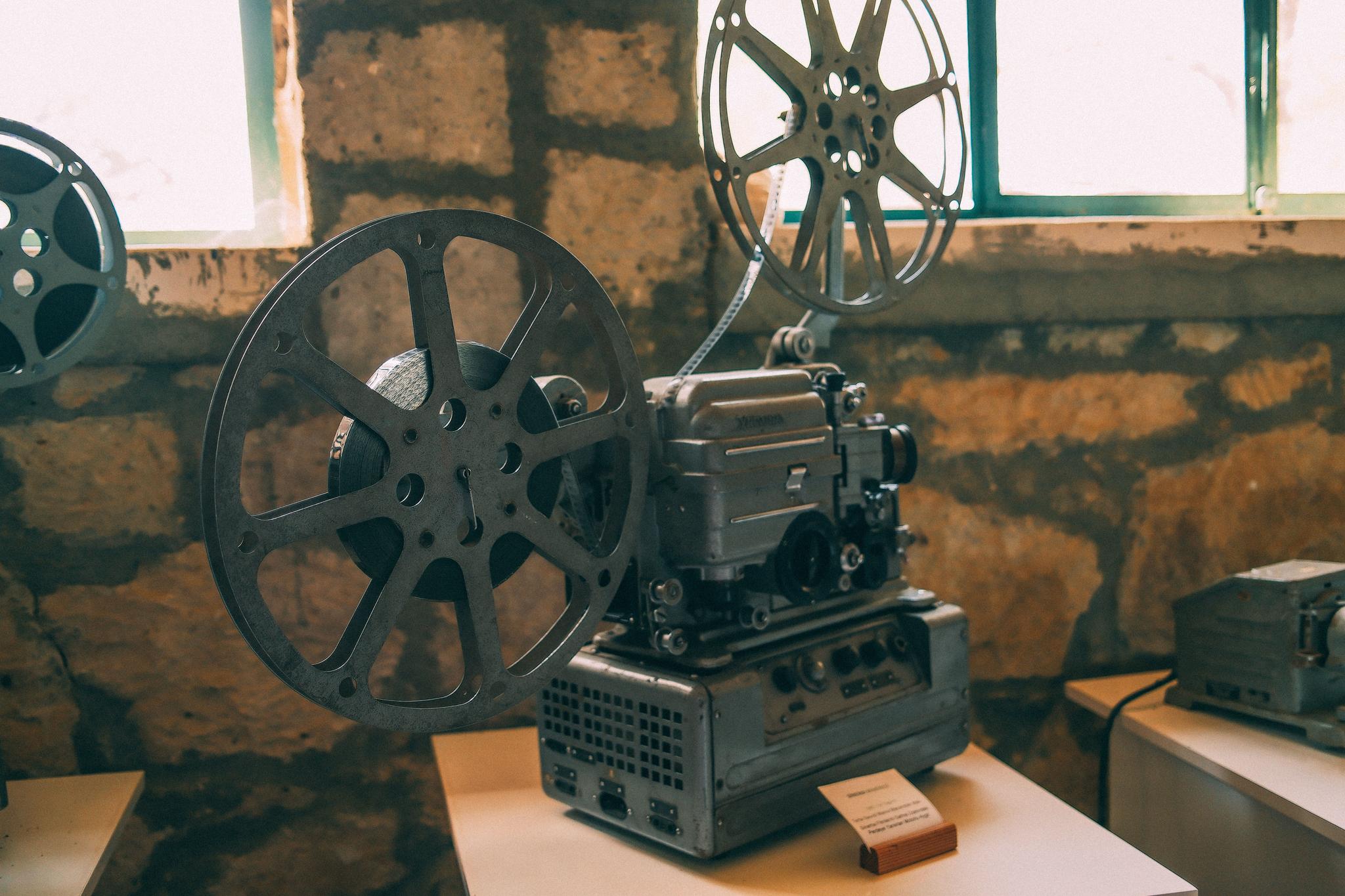 Vintage cine camera and film equipment.