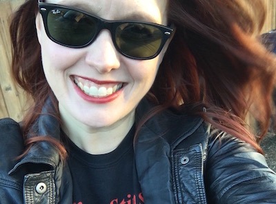Photo of Heather Campbell, UX writer, enjoying an actual sunny day in Seattle.