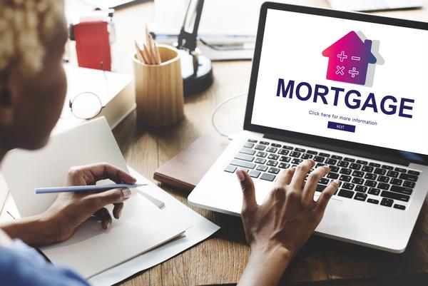 Comparing mortgages on laptop