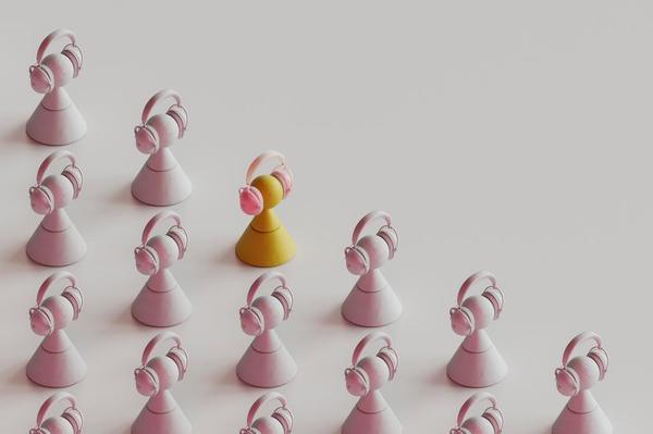 Group of board game pieces wearing headphones Group of board game pieces wearing headphones